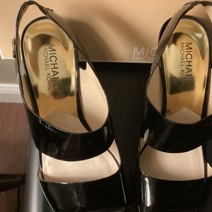 Rochelle pumps by MICHAEL Michael Kors patent leather with thick strap/gold logo